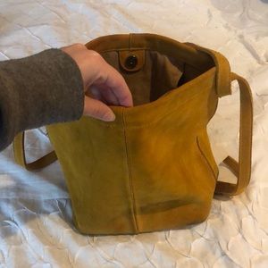 Yellow suede bucket bag